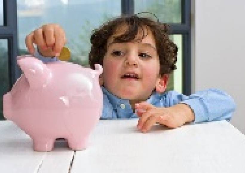 Kinderen leren omgaan met geld en sparen voor later